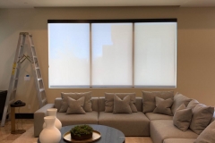 Custom-drapery-sheers-with-roller-shades.